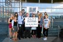 PETITION: Gary Smith (back, centre) and fellow members of charity, Ignite, at the Senedd