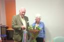 Chairman Robin Clark presents Jane Plummer with her retirement gift