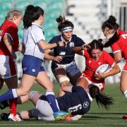 Wales' Georgia Evans is tackled by Scotland's Evie Gallagher (6) during the Guinness Women's Six Nations match at Scotstoun Stadium, Glasgow. Issue date: Saturday April 24, 2021.