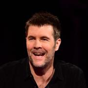 Rhod Gilbert reveals cancer diagnosis and tells fans he is 'disappearing for a while'. (PA)