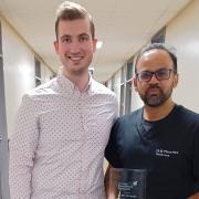 Dr Mohamed (right) was honoured for his services to Parkinson's in south Wales