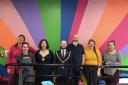 Barry Town Mayor cllr Ian Johnson (C) with consort Cllr Millie Collins (C) with  Eto Awesome Wales staff and volunteers at the shops opening