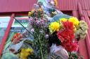 Flowers left at the scene in Kulsuma's memory