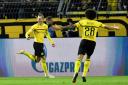Jacob Bruun Larsen, left, celebrates scoring Borussia Dortmund's opener goal