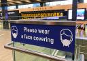 Face coverings are encouraged across the entire rail network - and remain mandatory in Wales
