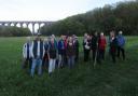 FUN: Walkers behind the viaduct at Porthkerry Country Park