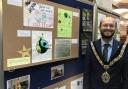 Cllr Ian Johnson launches fairtrade art exhibition which is available to see at Barry library until Friday, September 29
