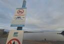 New signs up at Barry beach advising people not to swim due to water quality