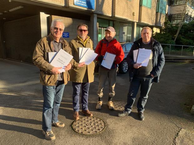 Barry And District News: Dennis Clarke with environmental campaigners, Paul Robertson from DIAG (Docks Incinerator Action Group) and Max Wallis from FoE Barry & Vale, and Plaid Cymru Councillor Nic Hodges, hand deliver responses to the Aviva consultation in January