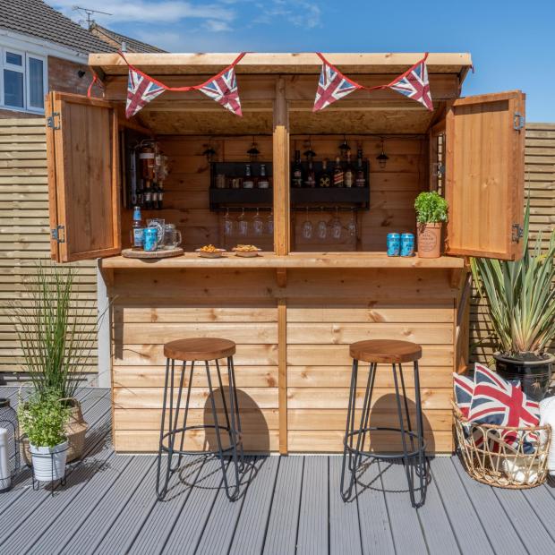 Barry And District News: Wooden Shiplap Garden Bar. Credit: The Range