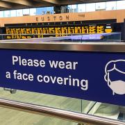 Face coverings are encouraged across the entire rail network - and remain mandatory in Wales