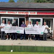 Specsavers Barry director, Jamie Pullen,, with members of Romilly Bowls Club