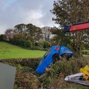 South Wales Police have called for people to drive according to the weather conditions after a car left the Cowbridge Bypass and ended up in the hedge. Picture: South Wales Police Road Policing Unit