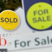 EMBARGOED TO 00001 TUESDAY OCTOBER 26 File photo dated 14/10/14 of estate agents boards. The housing market is set to record its highest level of sales this year since 2007, according to a property website. Issue date: Tuesday October 26, 2021.