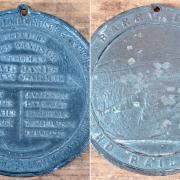 OLD: The front and back of the medallion (Picture: Richard Enos)
