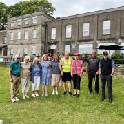 Wenvoe Castle golf club volunteers. Kevin Reaney in the yellow Hi-Viz jacket, Lesley Sherrard in the pink hi-viz jacket