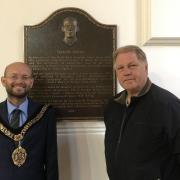 A memorial plaque to Gareth Jones at Merthyr Dyfan Cemetery Chapel, with Mayor of Barry, Cllr Ian Johnson, and Cllr Nic Hodges, Chair of Barry Town Council’s Halls, Cemeteries and Community Facilities Committee.