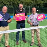 Wenvoe Councillor Russell Godfrey (L), Simon Johnson, CEO of Tennis Wales (C) with MP , Alun Cairns at the new courts at Wenvoe Park
