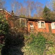 Local buyer: This twin terrace of South Wales tin-built bungalows listed for £1 at Paul Fosh Auctions, was sold for £40,500 after a bidding frenzy