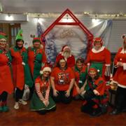 Staff from the Council's Family information services with Father Christmas