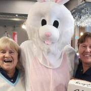 Brynhill Ladies captain Chris Hopkins, the Easter Bunny and competition winner Linda Hewlett