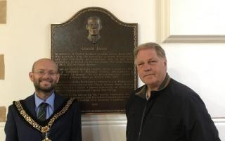 A memorial plaque to Gareth Jones at Merthyr Dyfan Cemetery Chapel, with Mayor of Barry, Cllr Ian Johnson, and Cllr Nic Hodges, Chair of Barry Town Council’s Halls, Cemeteries and Community Facilities Committee.