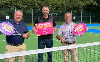 Wenvoe Councillor Russell Godfrey (L), Simon Johnson, CEO of Tennis Wales (C) with MP , Alun Cairns at the new courts at Wenvoe Park