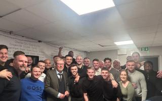 Harry Redknapp stops for pictures with Barry Town United team and supporters on February 16
